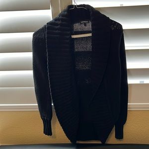 Mid length cardigan.